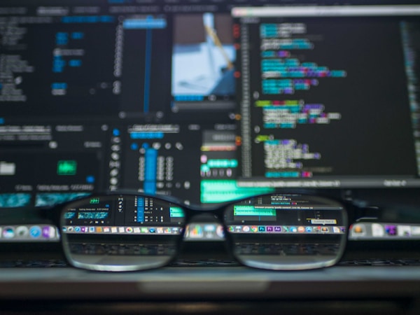 Developers writing code terminal screen close up